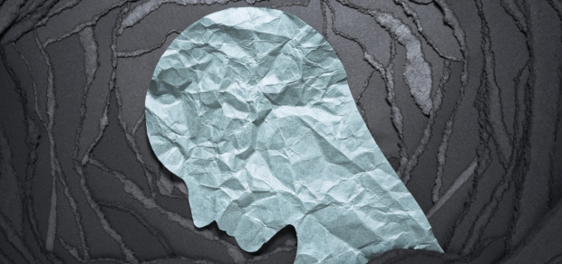 illustration of a head surrounded by a black background
